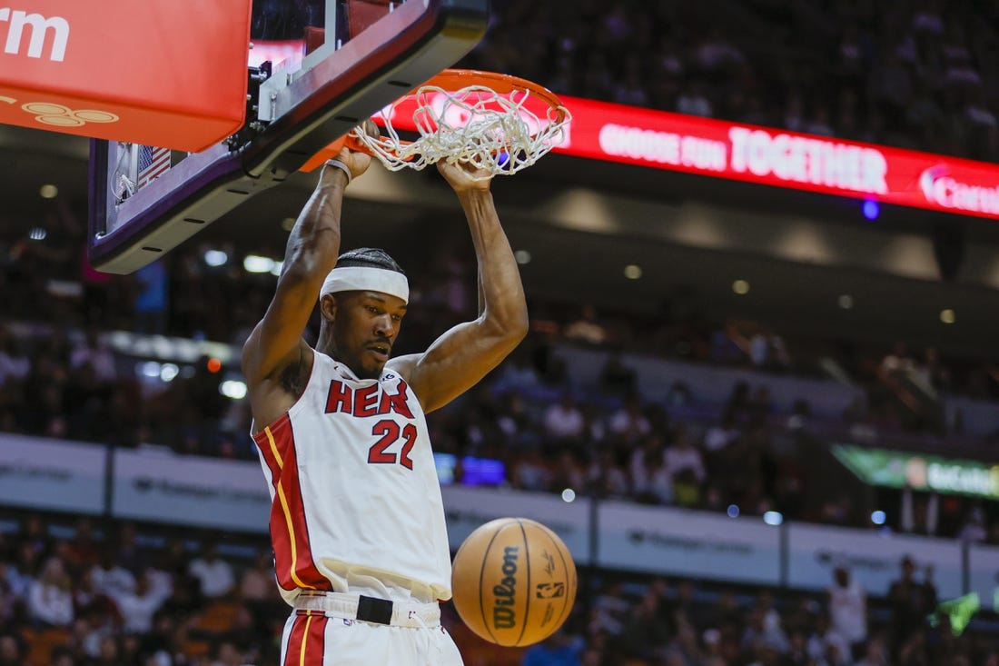 Apr 11, 2023; Miami, Florida, USA; Miami Heat forward Jimmy Butler (22) dunks the ball during the third quarter against the Atlanta Hawks at Kaseya Center. Mandatory Credit: Sam Navarro-USA TODAY Sports