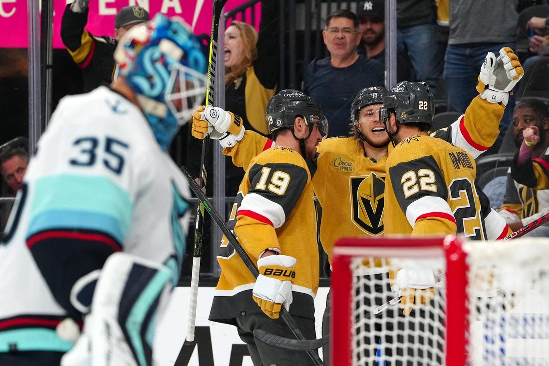 Apr 11, 2023; Las Vegas, Nevada, USA; Vegas Golden Knights right wing Michael Amadio (22) celebrates with Vegas Golden Knights right wing Reilly Smith (19) and Vegas Golden Knights center William Karlsson (71) after scoring against the Seattle Kraken during the second period at T-Mobile Arena. Mandatory Credit: Stephen R. Sylvanie-USA TODAY Sports