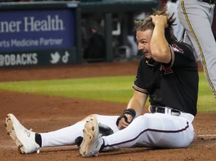 Arizona Diamondbacks' Jake McCarthy (31) reacts to being called out at home plate against the Milwaukee Brewers at Chase Field in Phoenix on April 12, 2023.

Mlb Brewers At D Backs