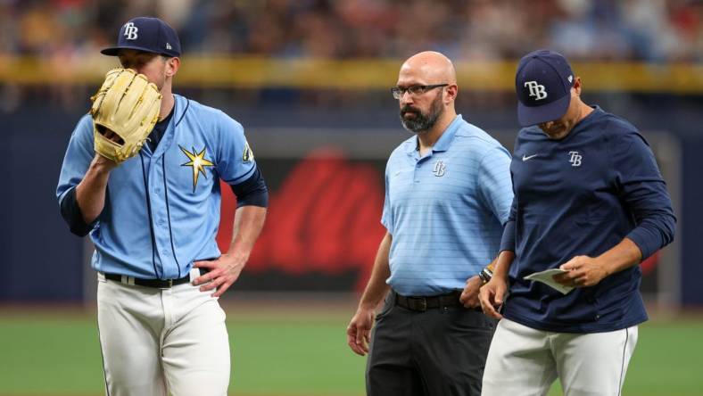 Apr 13, 2023; St. Petersburg, Florida, USA;  Tampa Bay Rays starting pitcher Jeffrey Springs (59) reacts after having to leave the game against the Boston Red Sox in the fourth inning at Tropicana Field. Mandatory Credit: Nathan Ray Seebeck-USA TODAY Sports