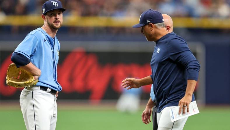 Apr 13, 2023; St. Petersburg, Florida, USA;  Tampa Bay Rays starting pitcher Jeffrey Springs (59) reacts after having to leave the game against the Boston Red Sox in the fourth inning at Tropicana Field. Mandatory Credit: Nathan Ray Seebeck-USA TODAY Sports