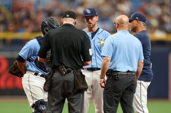 Apr 13, 2023; St. Petersburg, Florida, USA;  Tampa Bay Rays starting pitcher Jeffrey Springs (59) leaves the game against the Boston Red Sox with an injury in the fourth inning at Tropicana Field. Mandatory Credit: Nathan Ray Seebeck-USA TODAY Sports