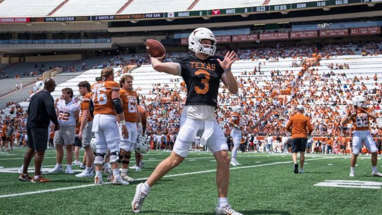 Texas quarterback Quinn Ewers (3) warms up ahead of the Longhorn's Orange and White spring football game in Darrell K Royal-Texas Memorial Stadium, Saturday, April 15, 2023.

Ewers