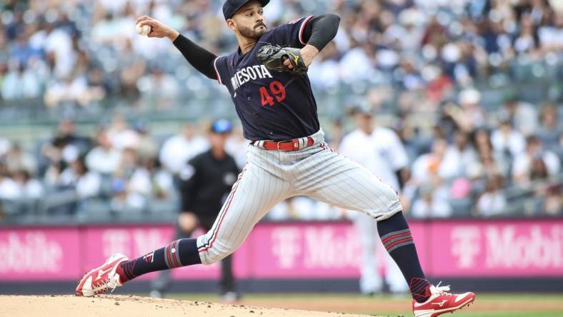 Apr 16, 2023; Bronx, New York, USA;  Minnesota Twins starting pitcher Pablo Lopez (49) pitches in the first inning against the New York Yankees at Yankee Stadium. Mandatory Credit: Wendell Cruz-USA TODAY Sports