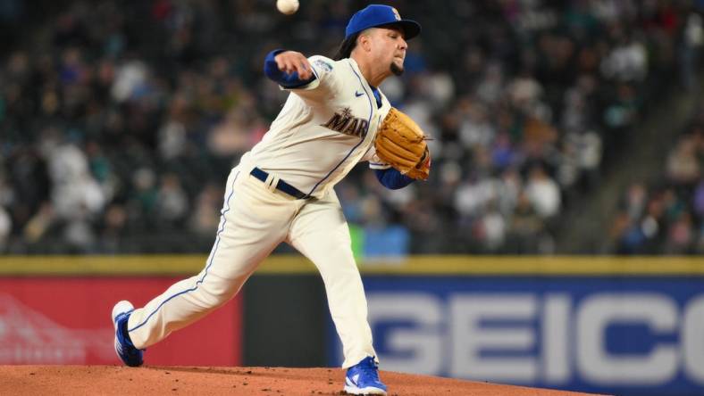 Apr 16, 2023; Seattle, Washington, USA; Seattle Mariners starting pitcher Luis Castillo (58) pitches to the Colorado Rockies during the first inning at T-Mobile Park. Mandatory Credit: Steven Bisig-USA TODAY Sports