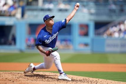 Apr 16, 2023; Los Angeles, California, USA; Los Angeles Dodgers starting pitcher Julio Urias (7) throws in the third inning against the Chicago Cubs at Dodger Stadium. Mandatory Credit: Kirby Lee-USA TODAY Sports