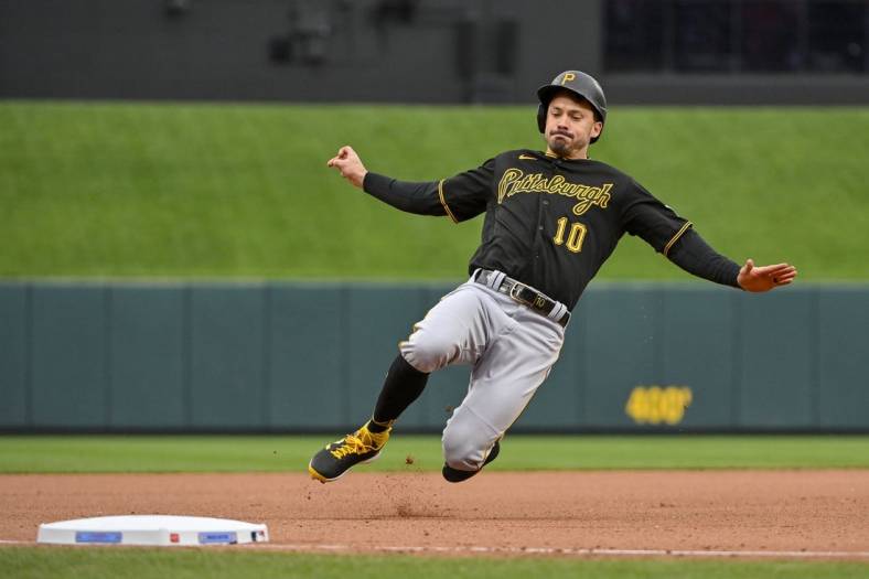 Apr 16, 2023; St. Louis, Missouri, USA;  Pittsburgh Pirates left fielder Bryan Reynolds (10) slides in at third against the St. Louis Cardinals during the seventh inning at Busch Stadium. Mandatory Credit: Jeff Curry-USA TODAY Sports