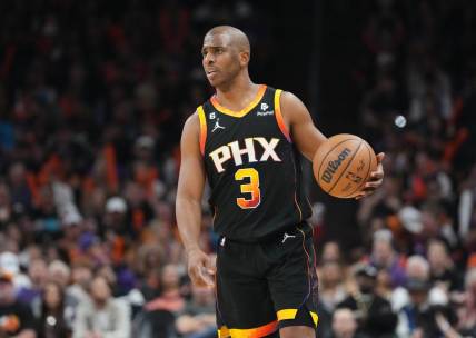 Apr 16, 2023; Phoenix, Arizona, USA; Phoenix Suns guard Chris Paul (3) dribbles against the LA Clippers during the second half of game one of the 2023 NBA playoffs at Footprint Center. Mandatory Credit: Joe Camporeale-USA TODAY Sports