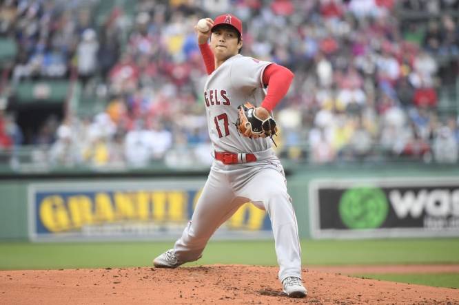Apr 17, 2023; Boston, Massachusetts, USA;  Los Angeles Angels starting pitcher Shohei Ohtani (17) pitches during the first inning against the Boston Red Sox at Fenway Park. Mandatory Credit: Bob DeChiara-USA TODAY Sports