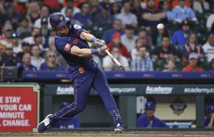 Apr 17, 2023; Houston, Texas, USA; Houston Astros center fielder Jake Meyers (6) hits a home run during the first inning against the Toronto Blue Jays at Minute Maid Park. Mandatory Credit: Troy Taormina-USA TODAY Sports