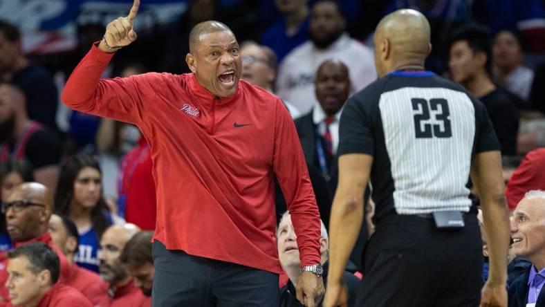 Apr 17, 2023; Philadelphia, Pennsylvania, USA; Philadelphia 76ers head coach Doc Rivers argues with referee Tre Maddox (23) during the fourth quarter in game two of the 2023 NBA playoffs against the Brooklyn Nets at Wells Fargo Center. Mandatory Credit: Bill Streicher-USA TODAY Sports