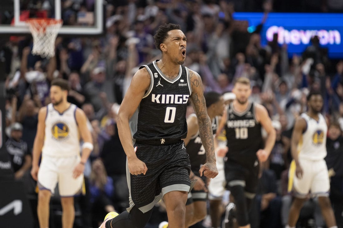 April 17, 2023; Sacramento, California, USA; Sacramento Kings guard Malik Monk (0) celebrates against the Golden State Warriors during the fourth quarter in game two of the first round of the 2023 NBA playoffs at Golden 1 Center. Mandatory Credit: Kyle Terada-USA TODAY Sports