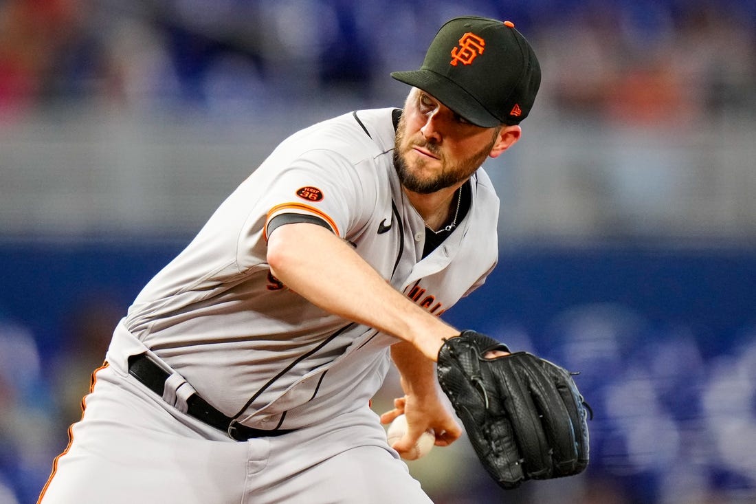 Apr 18, 2023; Miami, Florida, USA; San Francisco Giants starting pitcher Alex Wood (57) throws a pitch against the Miami Marlins during the first inning at loanDepot Park. Mandatory Credit: Rich Storry-USA TODAY Sports