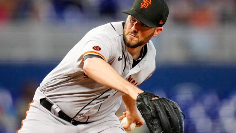 Apr 18, 2023; Miami, Florida, USA; San Francisco Giants starting pitcher Alex Wood (57) throws a pitch against the Miami Marlins during the first inning at loanDepot Park. Mandatory Credit: Rich Storry-USA TODAY Sports