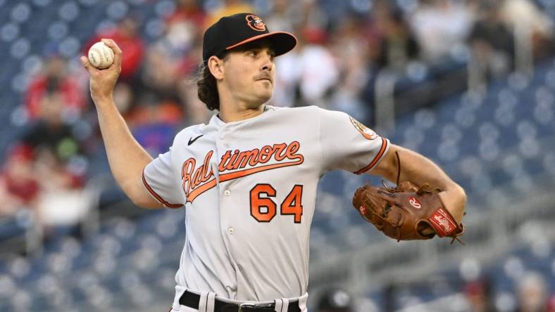 Apr 18, 2023; Washington, District of Columbia, USA; Baltimore Orioles starting pitcher Dean Kremer (64) throws to the Washington Nationals during the first inning at Nationals Park. Mandatory Credit: Brad Mills-USA TODAY Sports