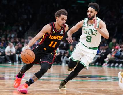 Apr 18, 2023; Boston, Massachusetts, USA; Atlanta Hawks guard Trae Young (11) drives the ball against Boston Celtics guard Derrick White (9) in the third quarter during game two of the 2023 NBA playoffs at TD Garden. Mandatory Credit: David Butler II-USA TODAY Sports