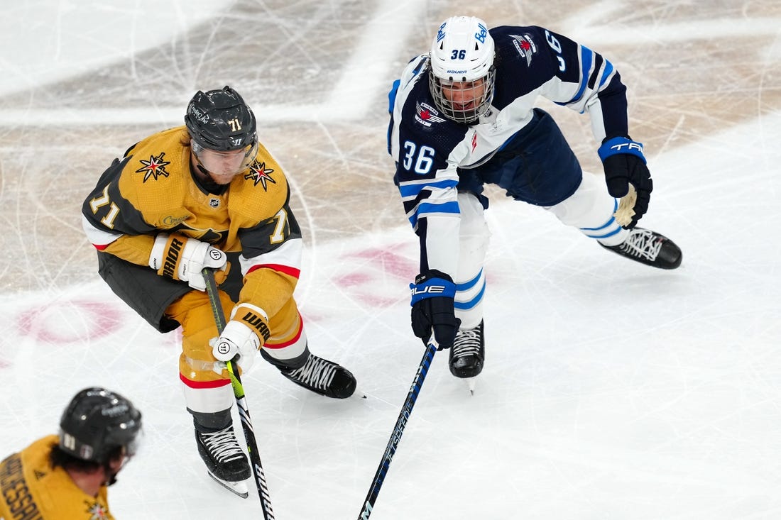 Apr 18, 2023; Las Vegas, Nevada, USA; Vegas Golden Knights center William Karlsson (71) skates against Winnipeg Jets center Morgan Barron (36) during the third period of game one of the first round of the 2023 Stanley Cup Playoffs at T-Mobile Arena. Mandatory Credit: Stephen R. Sylvanie-USA TODAY Sports