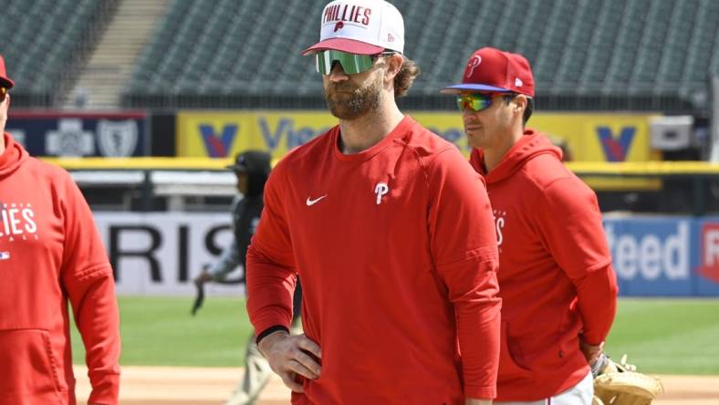 Apr 19, 2023; Chicago, Illinois, USA;   Philadelphia Phillies  Bryce Harper looks on prior to the game against the Chicago White Sox at Guaranteed Rate Field. Mandatory Credit: Matt Marton-USA TODAY Sports