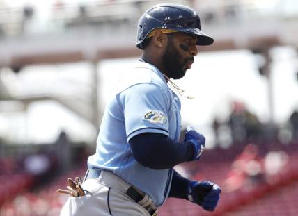 Apr 19, 2023; Cincinnati, Ohio, USA; Tampa Bay Rays first baseman Yandy Diaz (2) celebrates while running the bases after hitting a solo home run against the Cincinnati Reds during the first inning at Great American Ball Park. Mandatory Credit: David Kohl-USA TODAY Sports
