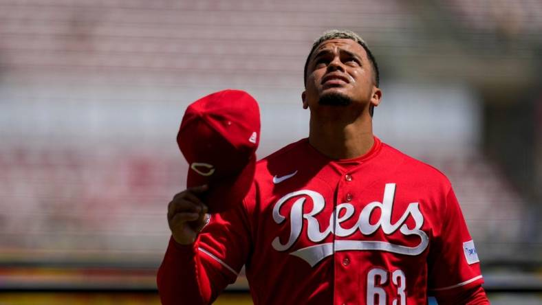 Cincinnati Reds releif pitcher Fernando Cruz (63) looks to the sky after pitching a scoreless top of the sixth inning of the MLB Interleague game between the Cincinnati Reds and the Tampa Bay Rays at Great American Ball Park in downtown Cincinnati on Wednesday, April 19, 2023.

Tampa Bay Rays At Cincinnati Reds