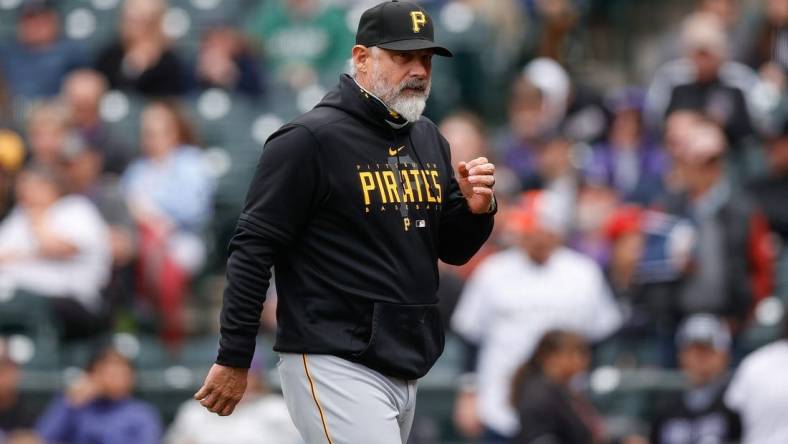 Apr 19, 2023; Denver, Colorado, USA; Pittsburgh Pirates manager Derek Shelton (17) walks to the dugout in the fifth inning against the Colorado Rockies at Coors Field. Mandatory Credit: Isaiah J. Downing-USA TODAY Sports