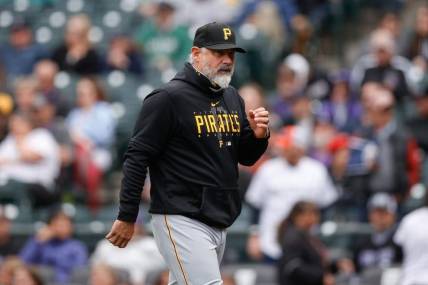 Apr 19, 2023; Denver, Colorado, USA; Pittsburgh Pirates manager Derek Shelton (17) walks to the dugout in the fifth inning against the Colorado Rockies at Coors Field. Mandatory Credit: Isaiah J. Downing-USA TODAY Sports