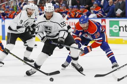 Apr 19, 2023; Edmonton, Alberta, CAN;Edmonton Oilers forward Leon Draisaitl (29) trips up Los Angeles Kings forward Quinton Byfield (55) during the second period in game two of the first round of the 2023 Stanley Cup Playoffs at Rogers Place. Mandatory Credit: Perry Nelson-USA TODAY Sports