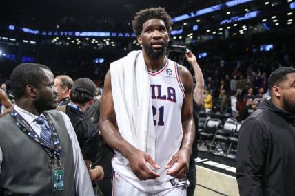 Apr 20, 2023; Brooklyn, New York, USA; Philadelphia 76ers center Joel Embiid (21) walks off the court after defeating the against the Brooklyn Nets 102-97 in game three of the 2023 NBA playoffs at Barclays Center. Mandatory Credit: Wendell Cruz-USA TODAY Sports