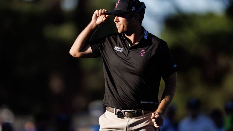 Apr 21, 2023; Adelaide, South Australia AUS; Talor Gooch of  team Rangegoats celebrates after finishing his round on the eleventh hole during the first round of LIV Golf Adelaide golf tournament at Grange Golf Club. Mandatory Credit: Mike Frey-USA TODAY Sports