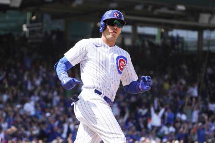 Apr 21, 2023; Chicago, Illinois, USA; Chicago Cubs center fielder Cody Bellinger (24) looks at the Los Angeles Dodgers dugout after hitting a home run during the third inning at Wrigley Field. Mandatory Credit: David Banks-USA TODAY Sports