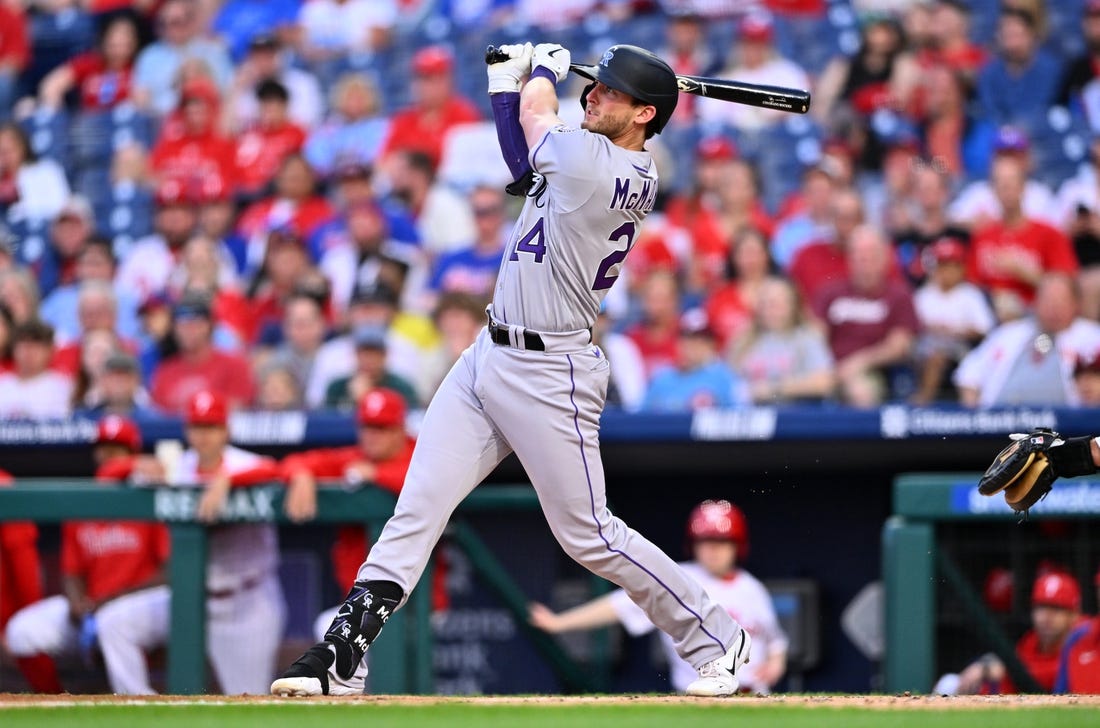 Apr 21, 2023; Philadelphia, Pennsylvania, USA; Colorado Rockies third baseman Ryan McMahon (24) hits a three-run home run against the Philadelphia Phillies in the first inning at Citizens Bank Park. Mandatory Credit: Kyle Ross-USA TODAY Sports