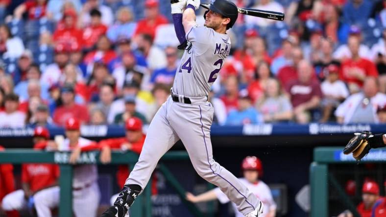 Apr 21, 2023; Philadelphia, Pennsylvania, USA; Colorado Rockies third baseman Ryan McMahon (24) hits a three-run home run against the Philadelphia Phillies in the first inning at Citizens Bank Park. Mandatory Credit: Kyle Ross-USA TODAY Sports