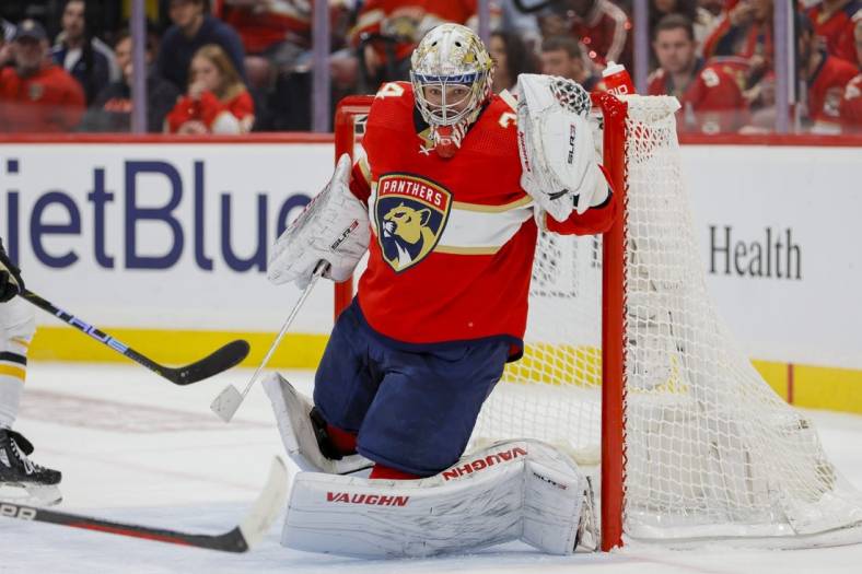 Apr 21, 2023; Sunrise, Florida, USA; Florida Panthers goaltender Alex Lyon (34) defends his net during the second period against the Boston Bruins in game three of the first round of the 2023 Stanley Cup Playoffs at FLA Live Arena. Mandatory Credit: Sam Navarro-USA TODAY Sports