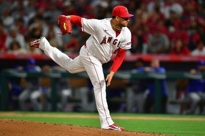 Apr 21, 2023; Anaheim, California, USA; Los Angeles Angels relief pitcher Jose Quijada (65) throws against the Kansas City Royals during the ninth inning at Angel Stadium. Mandatory Credit: Gary A. Vasquez-USA TODAY Sports