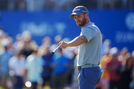 Apr 22, 2023; Avondale, Louisiana, USA; Wyndham Clark talks on the 18th green during the third round of the Zurich Classic of New Orleans golf tournament. Mandatory Credit: Andrew Wevers-USA TODAY Sports