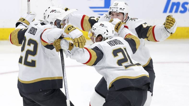 Apr 22, 2023; Winnipeg, Manitoba, CAN; Vegas Golden Knights celebrate the double overtime goal by Vegas Golden Knights right wing Michael Amadio (22) against the Winnipeg Jets in game three of the first round of the 2023 Stanley Cup Playoffs at Canada Life Centre. Mandatory Credit: James Carey Lauder-USA TODAY Sports