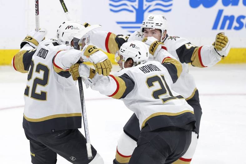 Apr 22, 2023; Winnipeg, Manitoba, CAN; Vegas Golden Knights celebrate the double overtime goal by Vegas Golden Knights right wing Michael Amadio (22) against the Winnipeg Jets in game three of the first round of the 2023 Stanley Cup Playoffs at Canada Life Centre. Mandatory Credit: James Carey Lauder-USA TODAY Sports