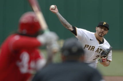 Apr 23, 2023; Pittsburgh, Pennsylvania, USA;  Pittsburgh Pirates starting pitcher Vince Velasquez (27) pitches to Cincinnati Reds second baseman Jonathan India (6) during the first inning at PNC Park. Mandatory Credit: Charles LeClaire-USA TODAY Sports
