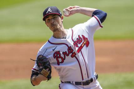 Apr 23, 2023; Cumberland, Georgia, USA; Atlanta Braves starting pitcher Max Fried (54) pitches against the Houston Astros during the first inning at Truist Park. Mandatory Credit: Dale Zanine-USA TODAY Sports