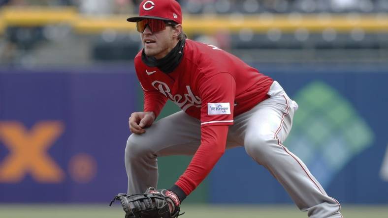 Apr 23, 2023; Pittsburgh, Pennsylvania, USA;  Cincinnati Reds first baseman Wil Myers (4) in the field against the Pittsburgh Pirates during the fourth inning at PNC Park. Mandatory Credit: Charles LeClaire-USA TODAY Sports