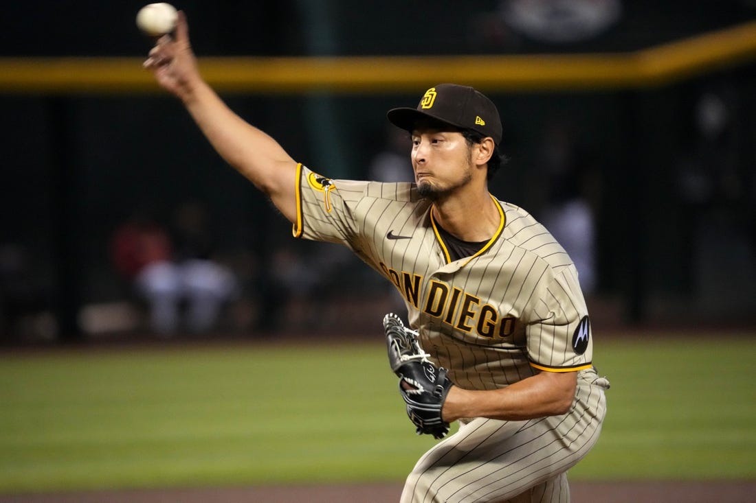 San Diego Padres' Matt Carpenter scores during the second inning