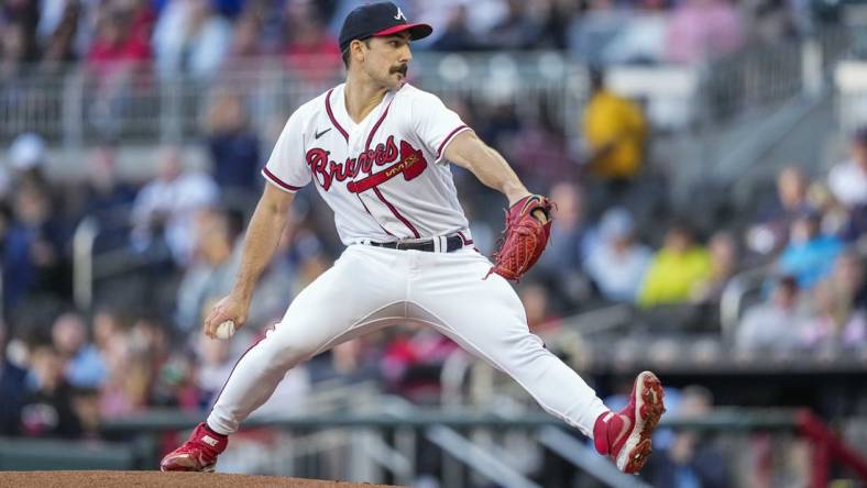 Apr 24, 2023; Cumberland, Georgia, USA; Atlanta Braves starting pitcher Spencer Strider (99) pitches against the Miami Marlins during the first inning at Truist Park. Mandatory Credit: Dale Zanine-USA TODAY Sports