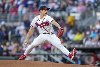 Apr 24, 2023; Cumberland, Georgia, USA; Atlanta Braves starting pitcher Spencer Strider (99) pitches against the Miami Marlins during the first inning at Truist Park. Mandatory Credit: Dale Zanine-USA TODAY Sports