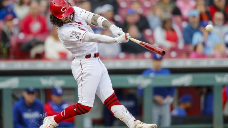 Apr 24, 2023; Cincinnati, Ohio, USA; Cincinnati Reds second baseman Jonathan India (6) hits a double against the Texas Rangers in the first inning at Great American Ball Park. Mandatory Credit: Katie Stratman-USA TODAY Sports