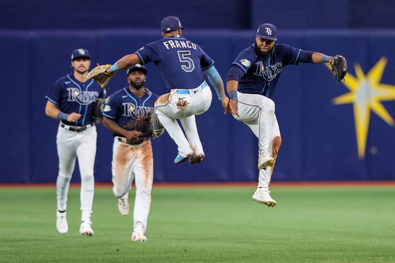 Tampa Bay Rays shortstop Wander Franco, left, and center fielder