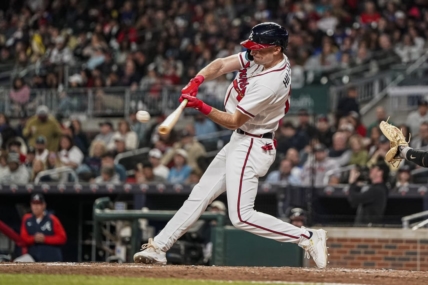Apr 24, 2023; Cumberland, Georgia, USA; Atlanta Braves center fielder Sam Hilliard (14) hits a home run against the Miami Marlins during the sixth inning at Truist Park. Mandatory Credit: Dale Zanine-USA TODAY Sports