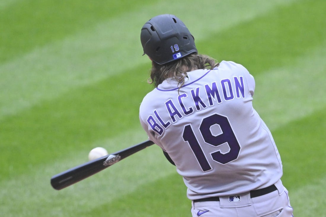 Colorado Rockies right fielder Charlie Blackmon hits a two-run