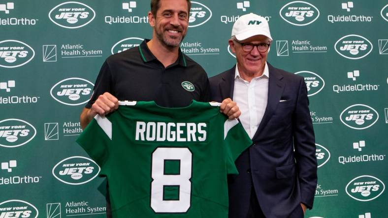 Apr 26, 2023; Florham Park, NJ, USA; New York Jets quarterback Aaron Rodgers (left) and owner Woody Johnson pose for a photo during the introductory press conference at Atlantic Health Jets Training Center. Mandatory Credit: Tom Horak-USA TODAY Sports