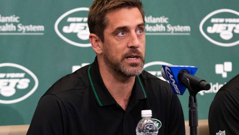 Apr 26, 2023; Florham Park, NJ, USA; New York Jets quarterback Aaron Rodgers (8) addresses the media during the introductory press conference at Atlantic Health Jets Training Center. Mandatory Credit: Tom Horak-USA TODAY Sports