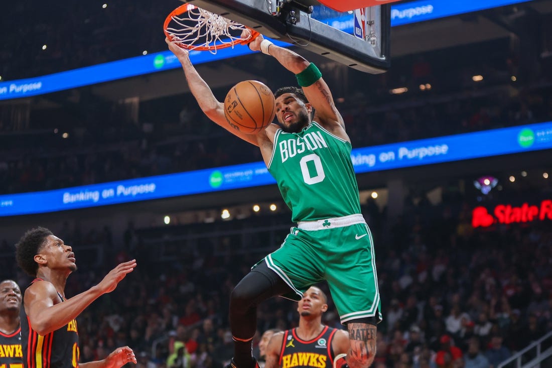 Apr 27, 2023; Atlanta, Georgia, USA; Boston Celtics forward Jayson Tatum (0) dunks the ball against the Atlanta Hawks in the first quarter during game six of the 2023 NBA playoffs at State Farm Arena. Mandatory Credit: Brett Davis-USA TODAY Sports